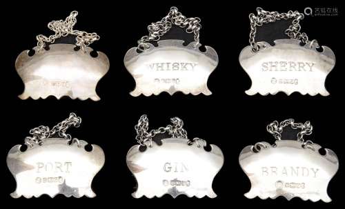 A set of six modern silver decanter labels