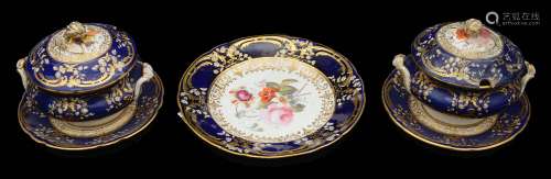 A pair of Coalport sauce tureens and stands and a dessert pl...