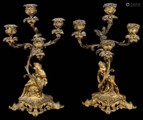 A pair of 19th c. Fr. Rococo ormolu figural four light cande...