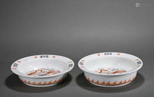 A pair of copper-red-glazed 'dragon' washer
