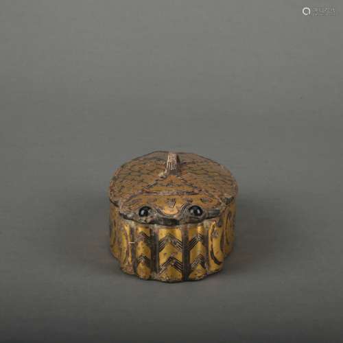 A bronze box and cover ware with gold and silver