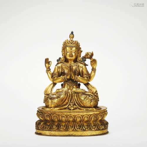 A gilt-bronze statue of four arm Avalokitesvara
