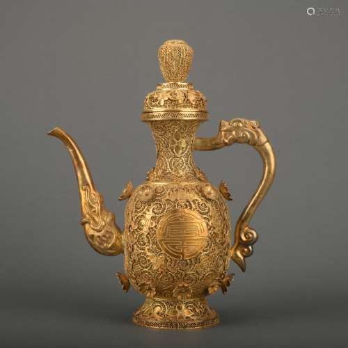 A gilt-bronze filigree winepot