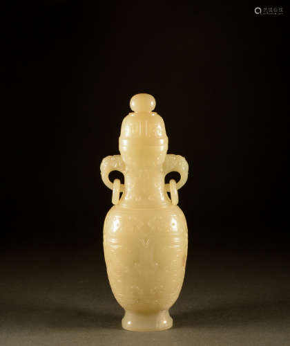 Qing Dynasty - Hetian jade vase with two ears and lid