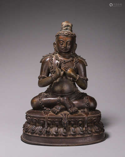 A copper Mahasiddha buddha statue