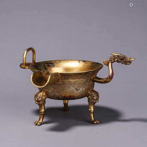 A gilding copper dragon head water pot