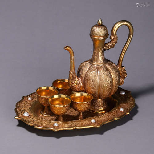 A set of flower patterned gilding copper wine pot and cups