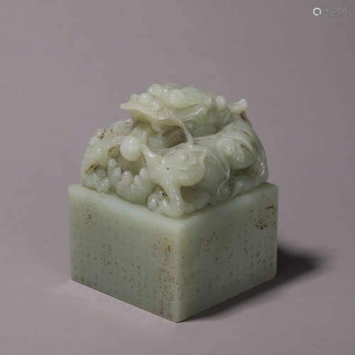 An inscribed Hetian jade seal