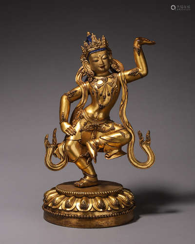 A gilding copper buddha statue