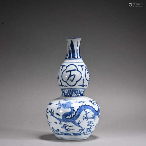 A blue and white 'dragon' gourd-shaped vase