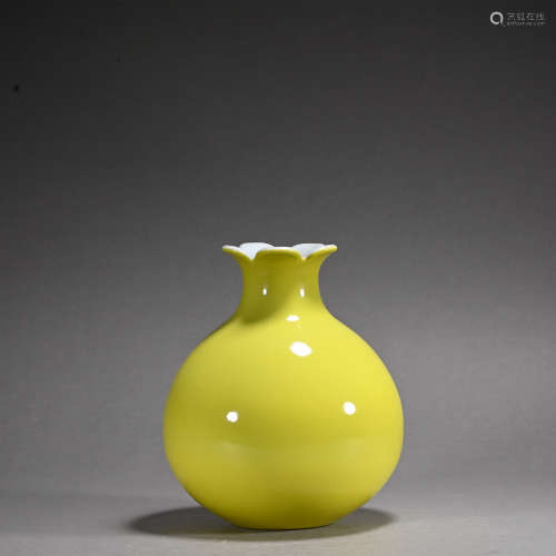 A yellow glazed vase