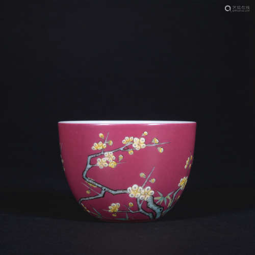 A red glazed 'floral' cup