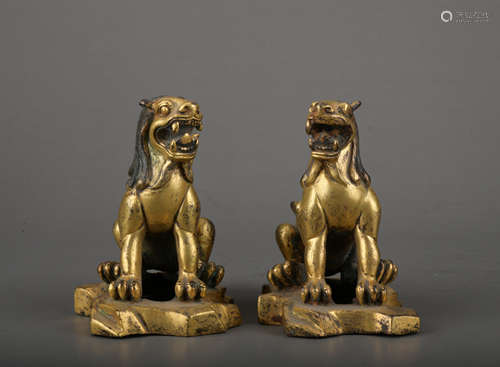 A pair of bronze beast