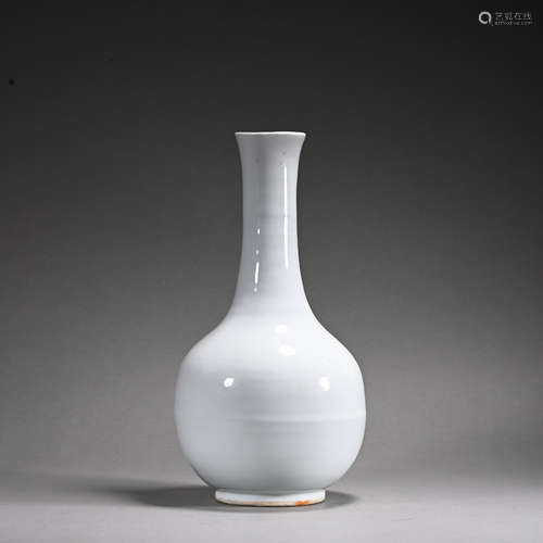 A white glazed vase