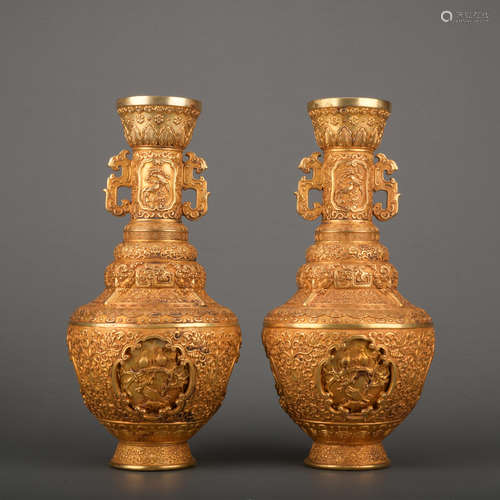 A pair of gilt-bronze vase