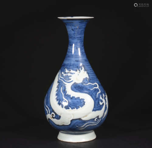 A blue glazed 'dragon' pear-shaped vase