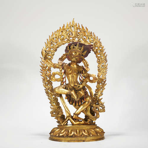 A gilt-bronze sitting buddha