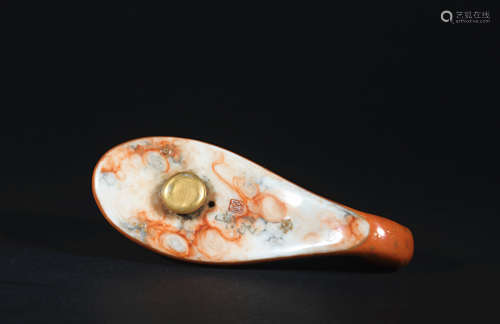 A red glazed spoon