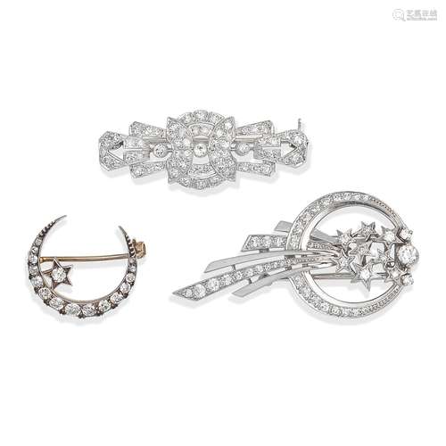 THREE DIAMOND BROOCHES AND ONE RUBY AND DIAMOND BROOCH (4)