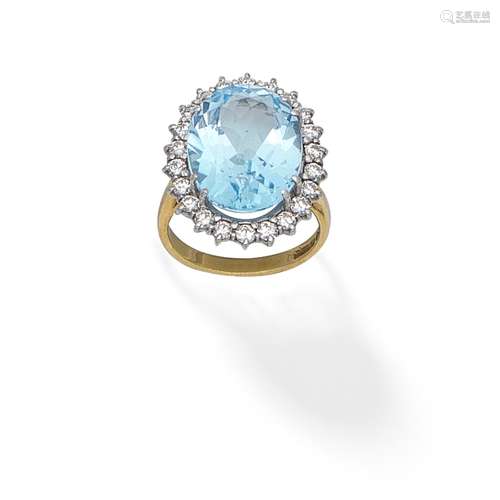 BLUE TOPAZ AND DIAMOND CLUSTER RING,