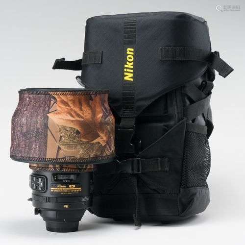 Appareil photographique. Dans sac de transport Nikon, object...