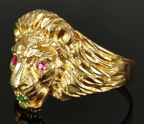 Ring as a lion head, finely carved in relief and the eyes se...