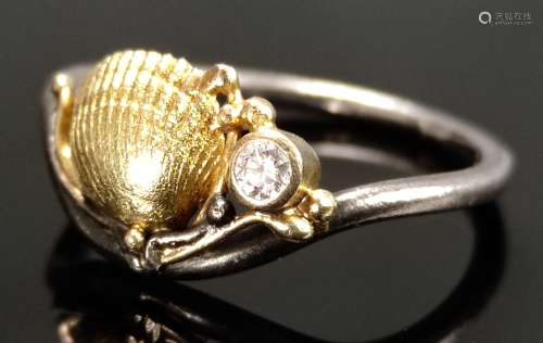 Nautical ring, centered shell element and small diamond arou...