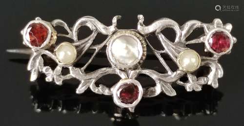 Brooch set with mother-of-pearl, seed pearls and garnets, fl...