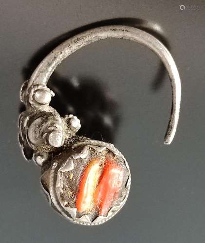 Antique jewelry object, probably earring, all around with al...