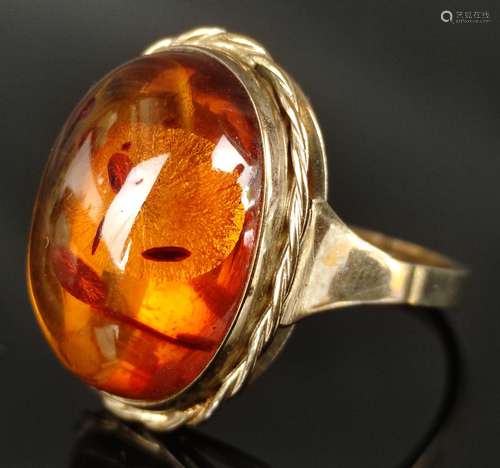 Ring with amber cabochon, natural inclusions, setting 333/8K...