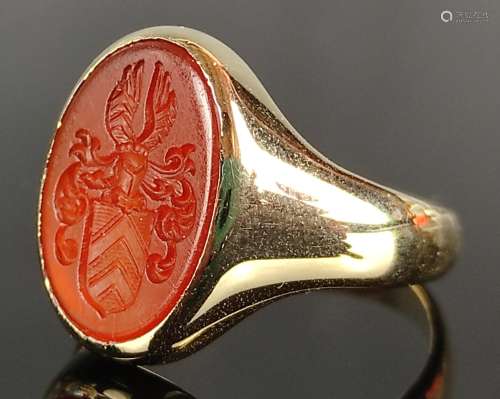 Crest ring, ring head set with oval carnelian, engraved with...