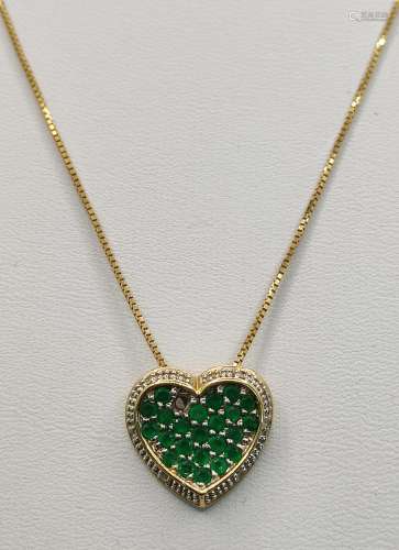 Heart pendant with emeralds (one missing) and small diamonds...