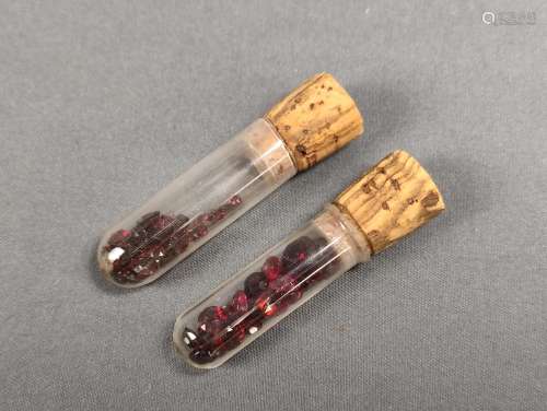 Two flacons with different size oval garnet stones Zwei Flak...