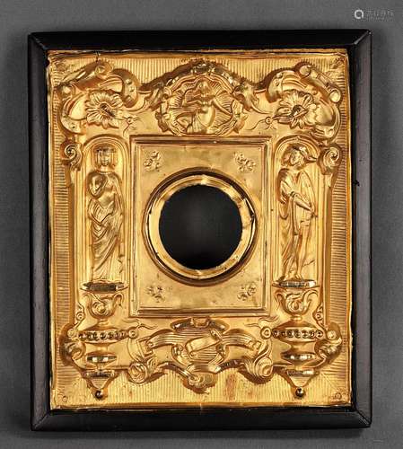 Clock stand in the shape of a frame, gold plate in relief, a...