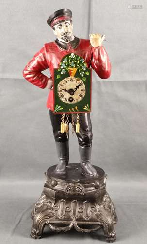 Clock man, on base with acanthus feet, round pedestal, on it...