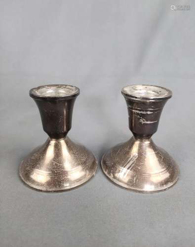 Two candlesticks, sterling silver, weighted, 219g, h 7.5cm Z...