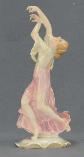 Dancer, in dramatic pose, on curved base, finely polychrome ...