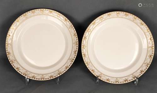 Two plates, slightly stepped, with relief rim, this one heig...