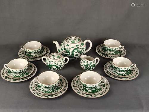 A tea service, consisting of a teapot (height 12.5cm), sugar...