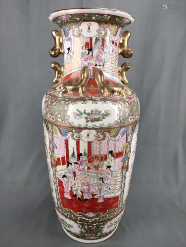 A large floor vase decorated with polychrome scenes and flor...