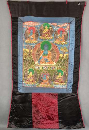 Thangka, with Bhaiṣajyaguru (Medicine Buddha) in the centre,...