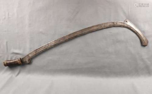 Throwing iron, slightly sickle-shaped, chased, wooden handle...