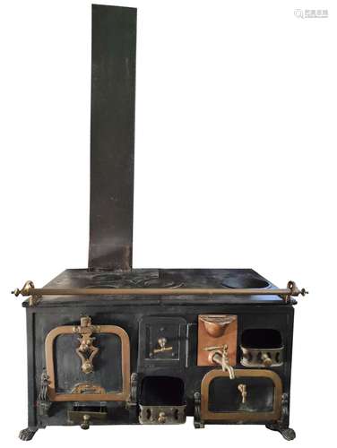 Antique children's play stove/oven, three hotplates, brass b...