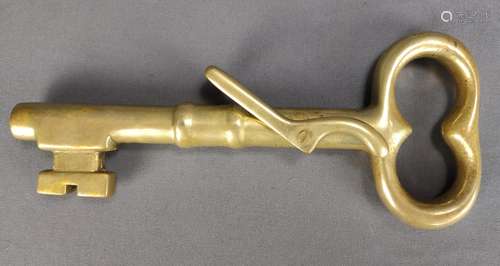 Large brass key, brand