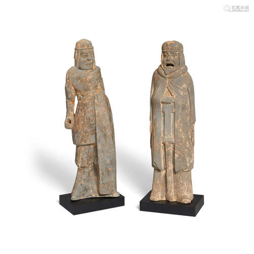 Two gray pottery figures of soldiers