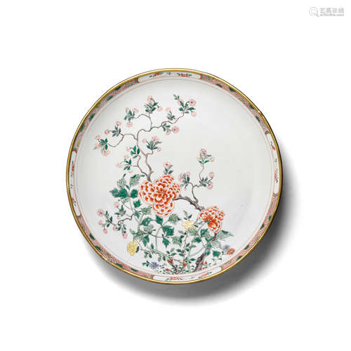 A large famille verte enameled porcelain 'peony' charger