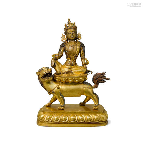 A gilt bronze figure of manjushri