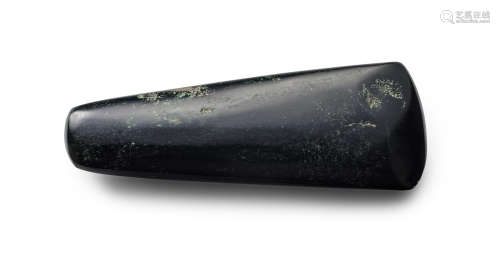 A large Neolithic black jade blade