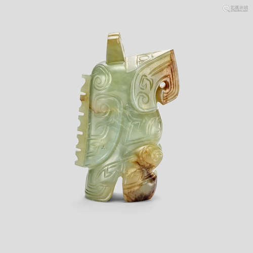 A grey-celadon, russet and black Jade owl pendant