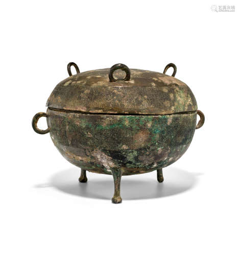 An archaic Cast Bronze Tripod Vessel and Cover, ding
